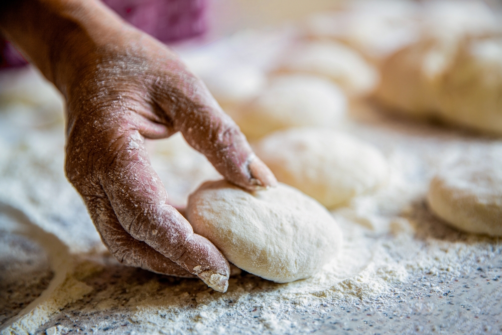 Womans-hands-rolling-doughs